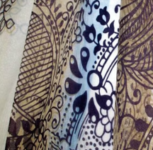 Patterned drapery fabric